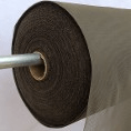 Roll of brown mesh fabric on a spindle, showcasing its texture and color, relevant for DIY projects or crafting materials.